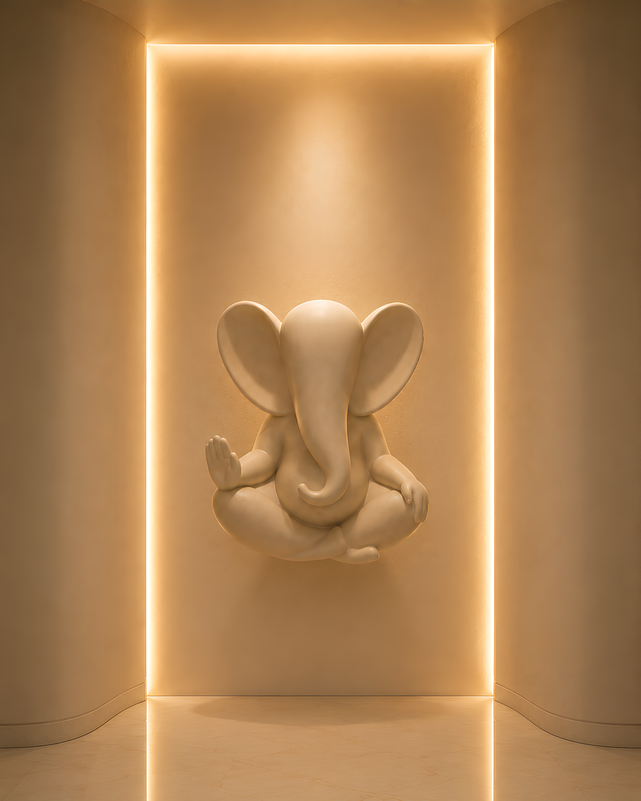 Serene Ganesha wall installation lit by warm architectural lighting